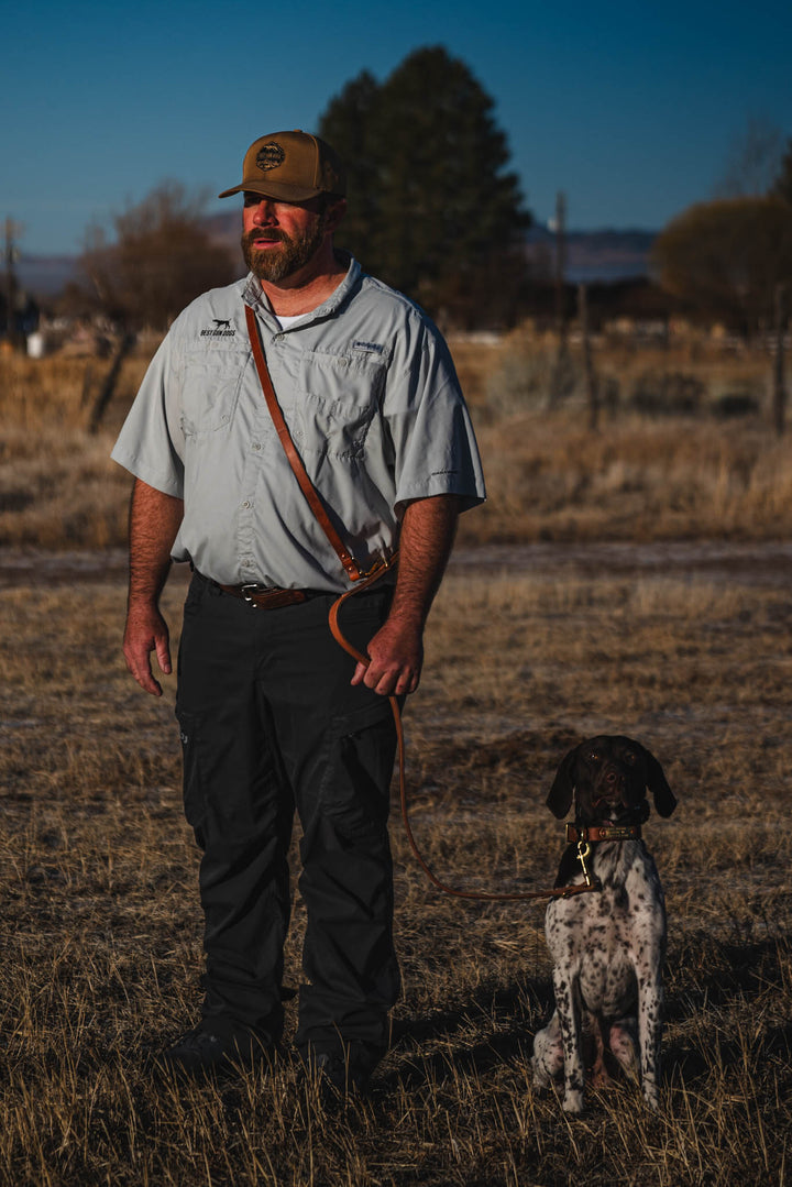 Jaeger Lead used during a German Shorthaired Pointer training session. Ideal for professional bird dog training and upland hunting dogs retrieving game. Perfect gear for puppy training courses demonstration.