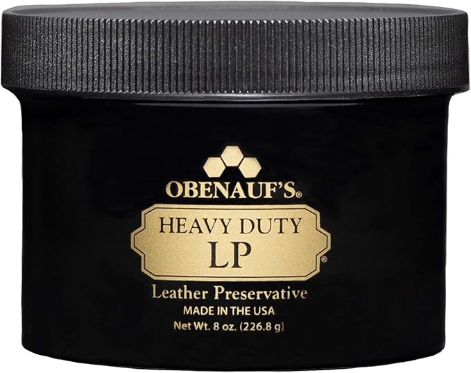 Obenauf's Heavy Duty LP Leather Preservative (8oz)- All Natural Beeswax Oil Conditioner used during a German Shorthaired Pointer training session. Ideal for professional bird dog training and upland hunting dogs retrieving game. Perfect gear for puppy training courses demonstration.