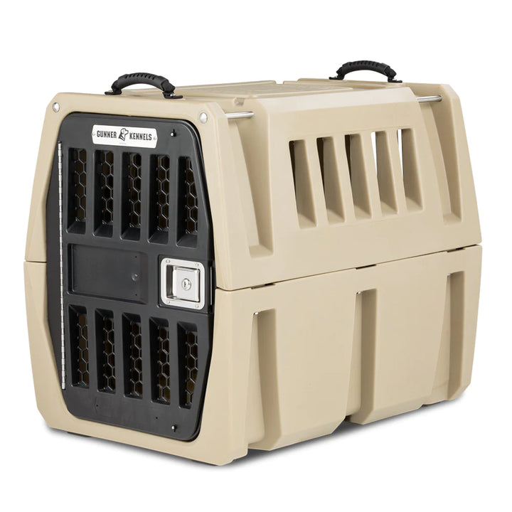 GUNNER G1™ KENNEL sturdy beige double-walled dog crate with secure lock and ventilation handles.