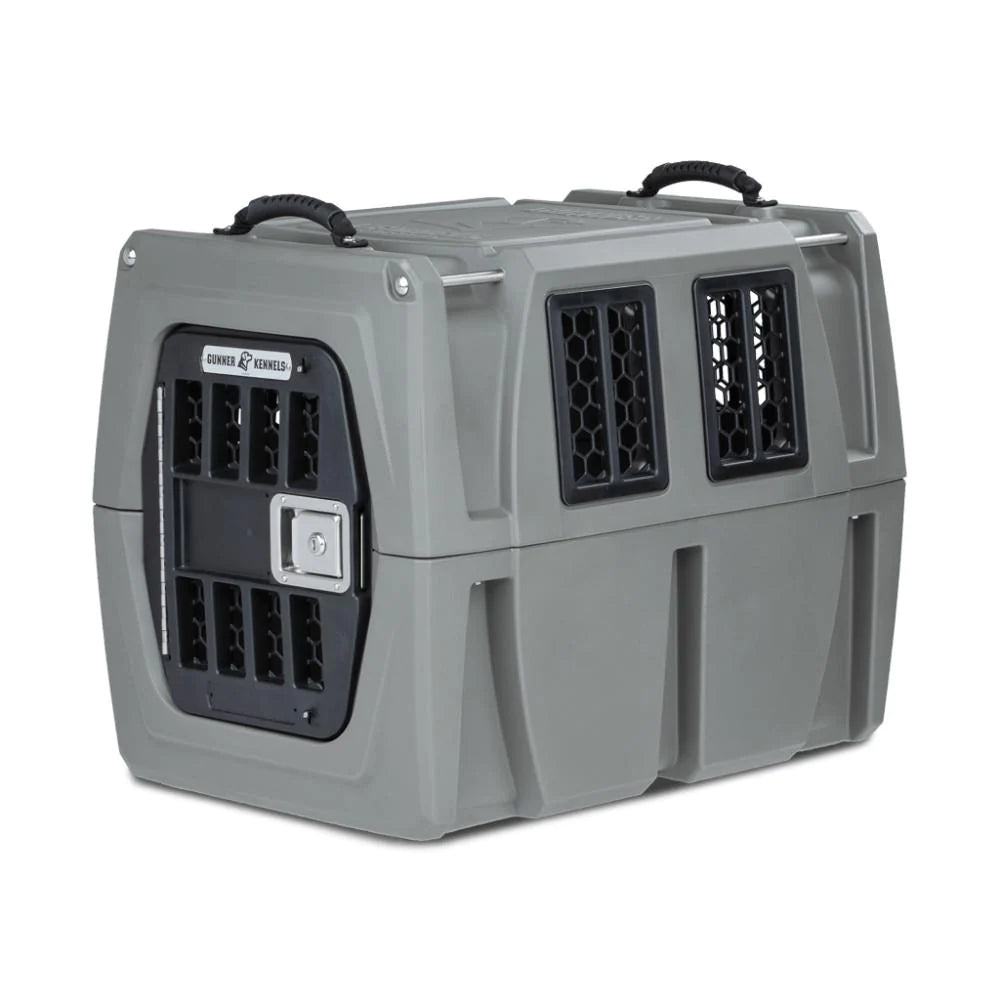 GUNNER G1™ KENNEL gray heavy-duty double-walled dog crate with ventilation panels and secure locking door.