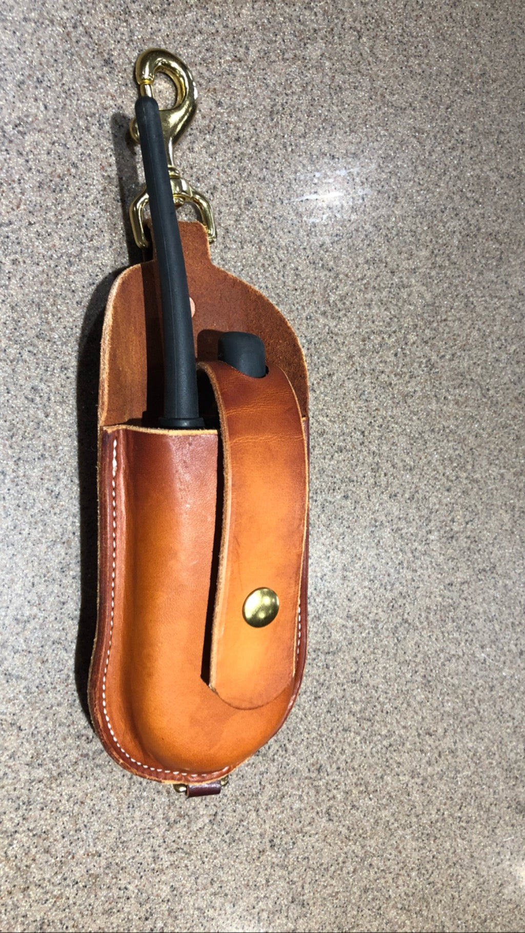 Leather Garmin Case made in USA with premium saddle leather, brass hardware, and military-grade snap for durability.