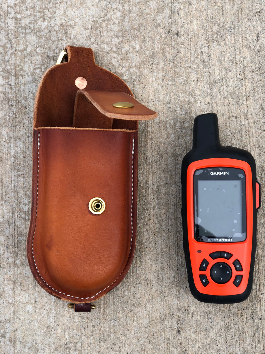 Leather Garmin Case made in USA with premium leather, brass hardware, and durable stitching for Garmin Alpha GPS devices.