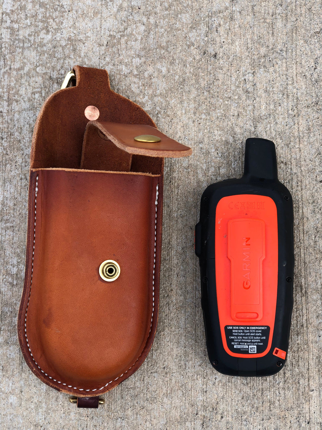 Leather Garmin Case with sturdy brass hardware, premium USA-made leather holster for Garmin Alpha 100 and 200 devices.
